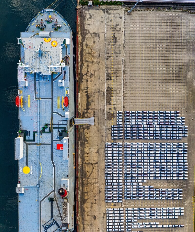 A cargo ship is seen sailing in the ocean